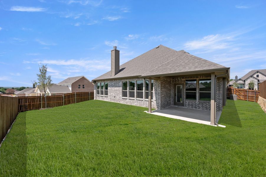 Exterior details and patio area of a home in Waterford Park, Weatherford (Image 20).