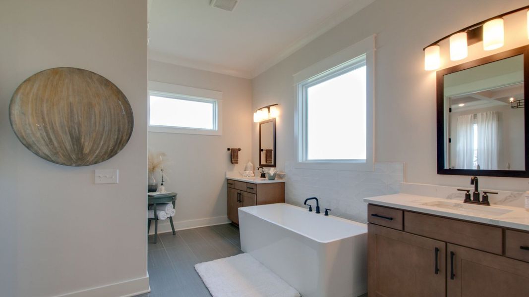 Primary Bathroom with split dual-vanity and freestanding tub Primary Bathroom with split dual-vanity and freestanding tub