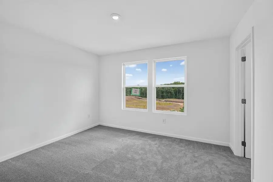Spacious, unfurnished interior of a new home in Weatherfield, Buford (Image 31).