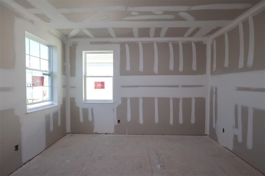 In-progress construction of a new home in Eden at Crossprairie, St. Cloud, FL (Image 12).