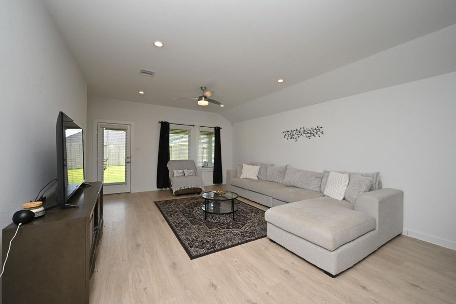 Natural light streams in through the patio door and windows, enhancing the airy feel. Ideal for relaxation and entertaining. Natural light streams in through the patio door and windows, enhancing the airy feel. Ideal for relaxation and entertaining.