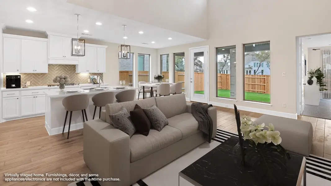 Representative furnished interior of a home built from the 2442W by Perry Homes in Lariat 45', Liberty Hill (Image 6).