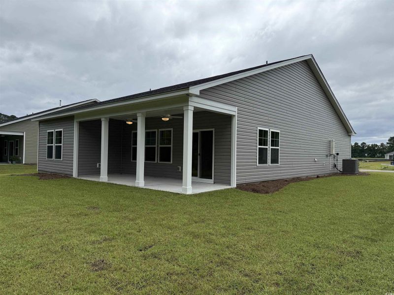 Exterior details and patio area of a home in Beach Gardens, Conway (Image 17). Exterior details and patio area of a home in Beach Gardens, Conway (Image 17).