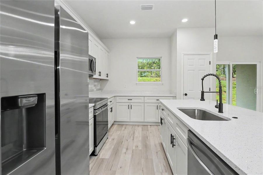 Furnished interior view inside a new home in , Citrus Springs (Image 13).