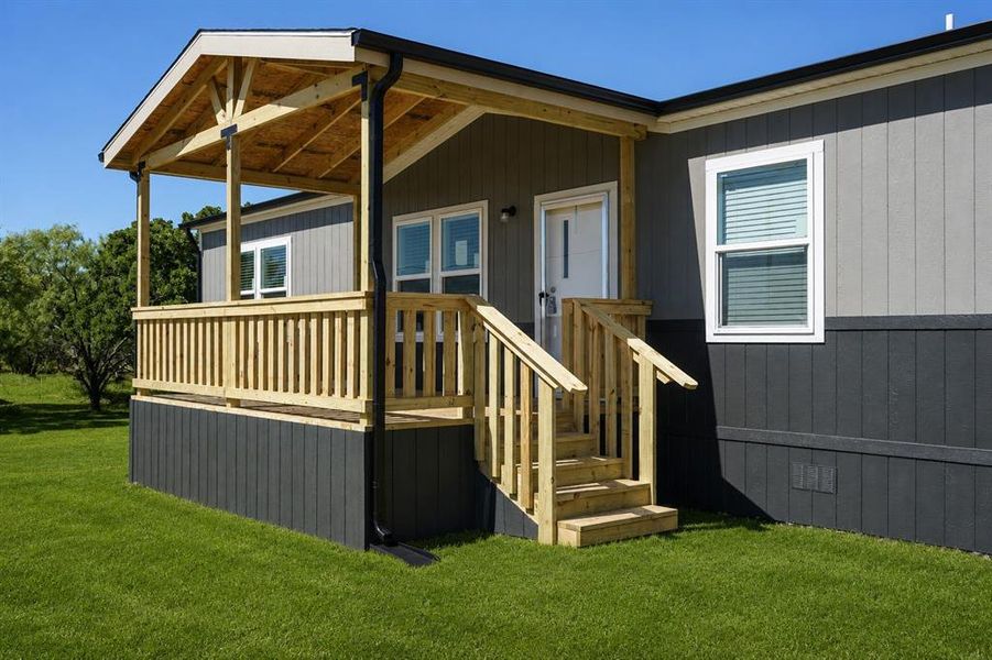 Exterior details and patio area of a home in , Poolville (Image 24).