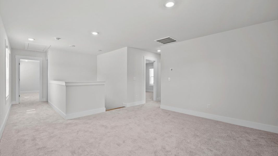 Representative furnished interior of a home built from the Jasmine by DRB Homes in Harrier Point, Woodruff (Image 11).