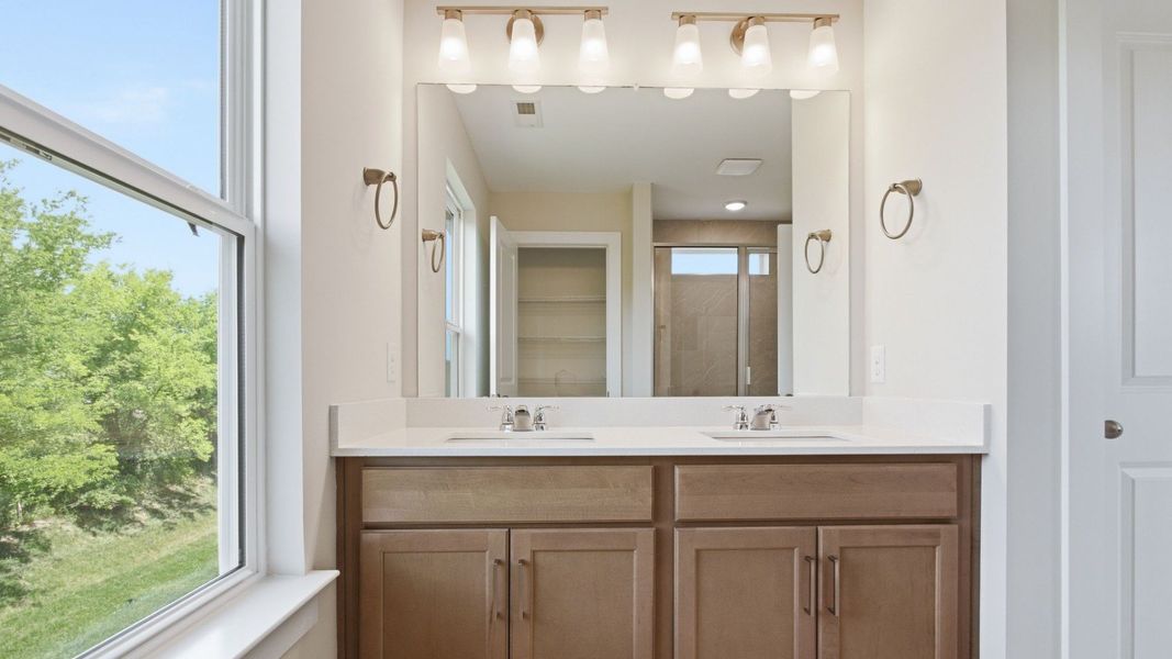 Bathroom with window and double vanity Bathroom with window and double vanity