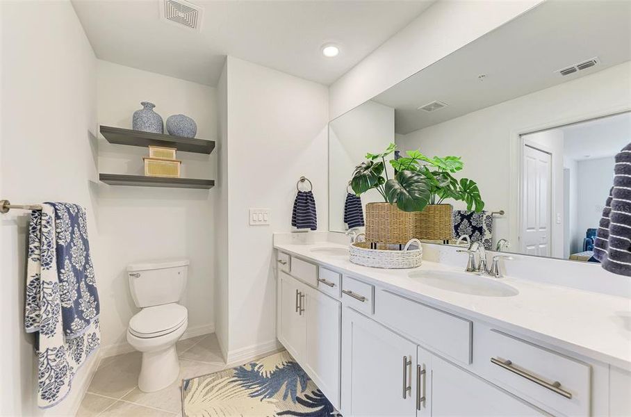 Furnished interior view inside a new home in Wellen Park Golf & Country Club, Venice (Image 14).