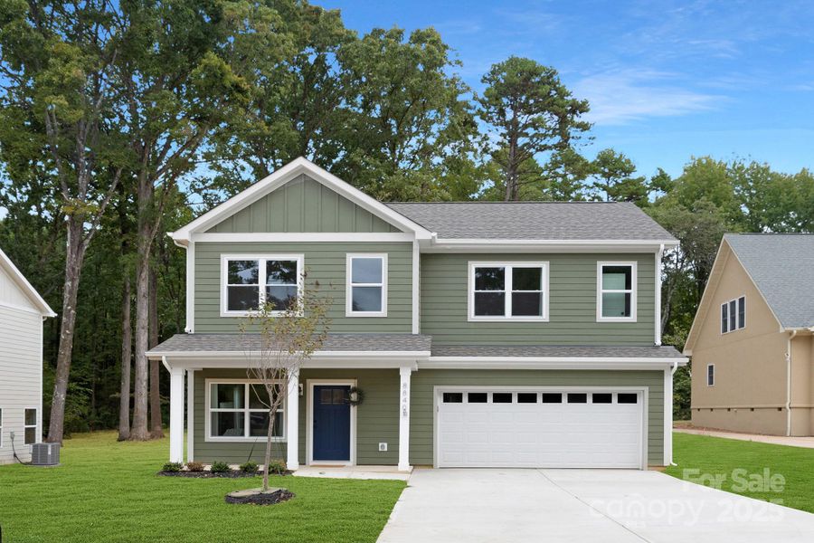 Front exterior of a new home in , Charlotte, NC, highlighting curb appeal (Image 22).