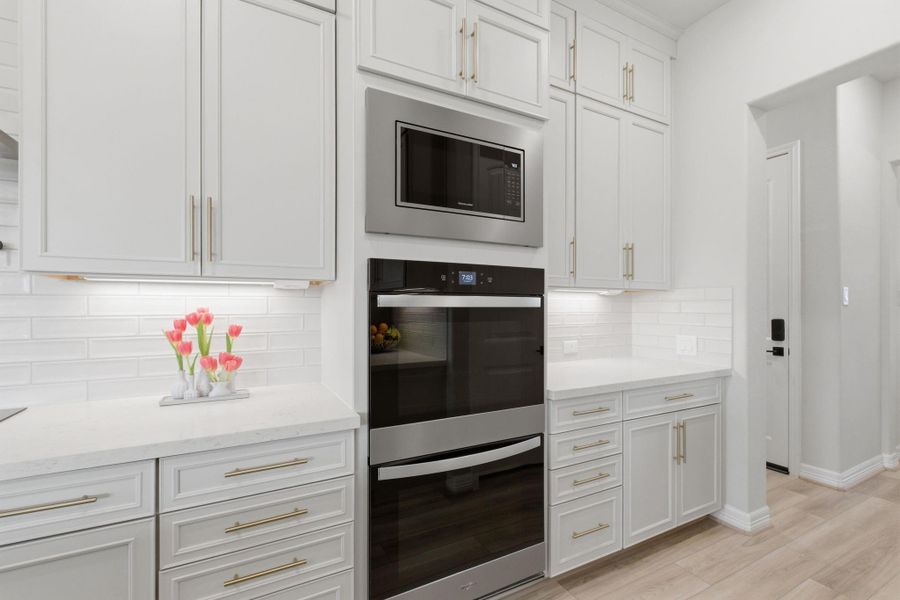 Furnished interior view inside a new home in Sunterra 45ft, Katy (Image 24).