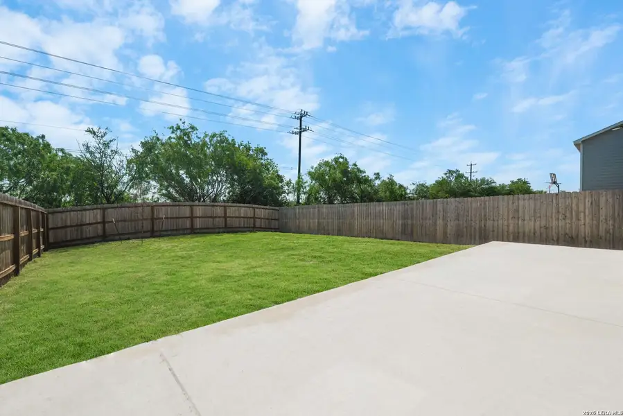 Exterior details and patio area of a home in Mission Del Lago, San Antonio (Image 25).