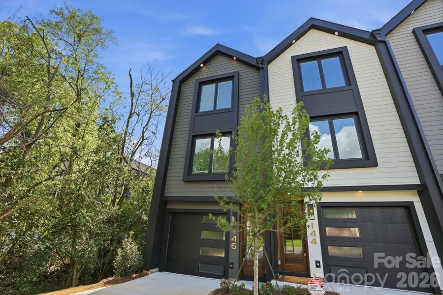Front exterior of a new home in , Charlotte, NC, highlighting curb appeal (Image 26).