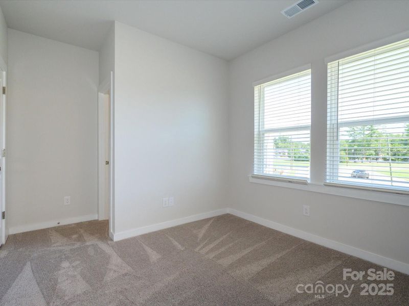 Spacious, unfurnished interior of a new home in Central Living at Craig, Charlotte (Image 31).