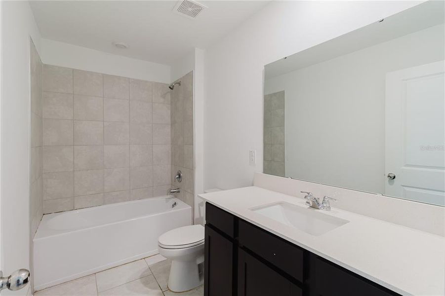 Furnished interior view inside a new home in Peace Creek Reserve, Winter Haven (Image 11). Furnished interior view inside a new home in Peace Creek Reserve, Winter Haven (Image 11).