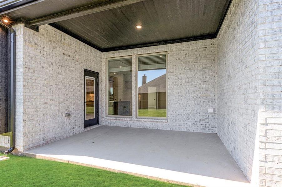 Exterior details and patio area of a home in Mockingbird Hills 60-65, Joshua (Image 21). Exterior details and patio area of a home in Mockingbird Hills 60-65, Joshua (Image 21).