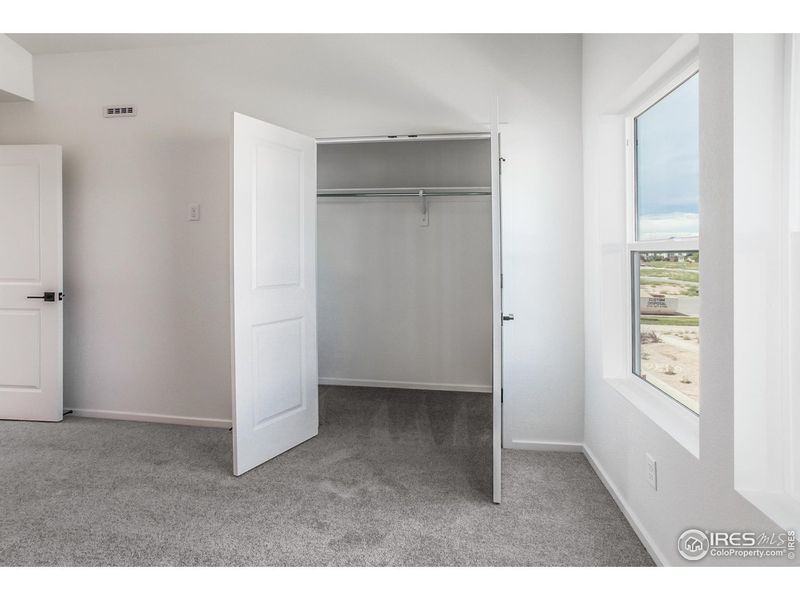 Spacious, unfurnished interior of a new home in Bloom Trailblazer Collection - Single Family Homes, Fort Collins (Image 30).