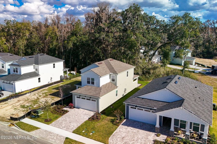 Front exterior of a new home in , St. Johns, FL, highlighting curb appeal (Image 25).