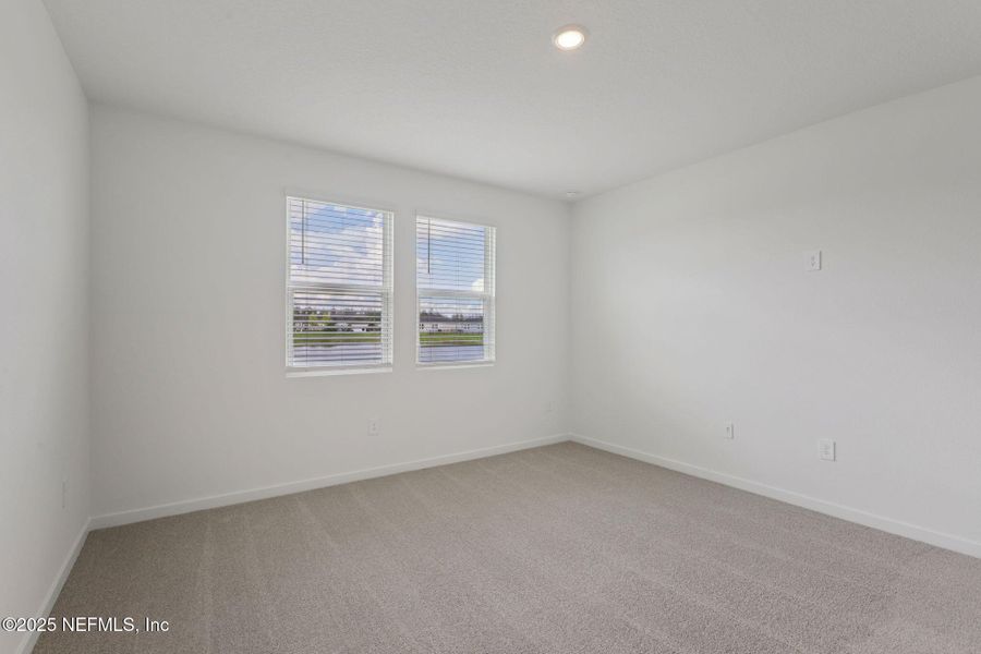 Spacious, unfurnished interior of a new home in Lakes at Bella Lago - Signature Series, Green Cove Springs (Image 13). Spacious, unfurnished interior of a new home in Lakes at Bella Lago - Signature Series, Green Cove Springs (Image 13).