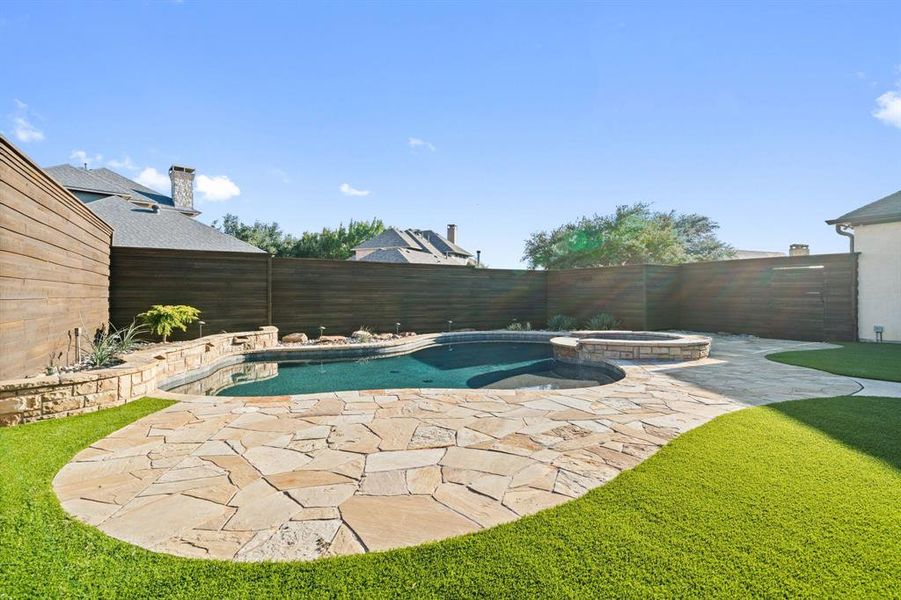 Low maintenance turf has been added to the backyard.  No mowing, fertilizing or weeding needed!