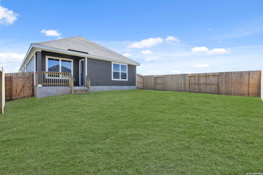 Exterior details and patio area of a home in Hickory Ridge, Elmendorf (Image 17).