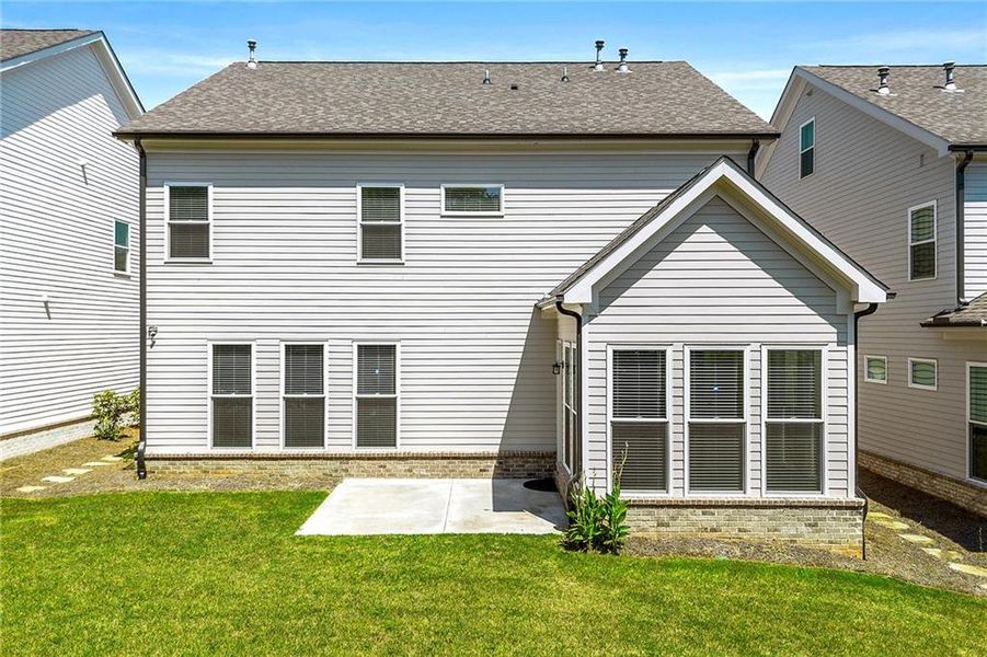 Front exterior of a new home in , Duluth, GA, highlighting curb appeal (Image 21).