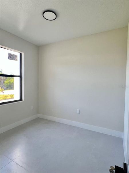 Spacious, unfurnished interior of a new home in , Port Charlotte (Image 50).