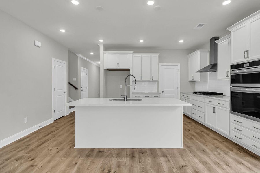 Furnished interior view inside a new home in Tidewater at Lakes of Cane Bay, Summerville (Image 11).