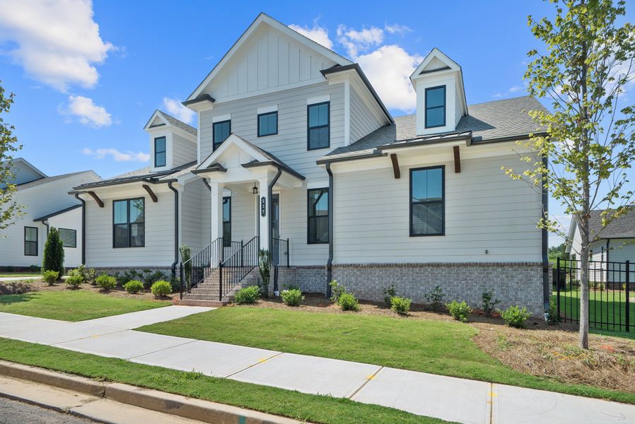 Representative exterior photo of a completed home built from the The Lassiter by The Providence Group in Promenade at Sawnee Village, Cumming, GA (Image 23). Representative exterior photo of a completed home built from the The Lassiter by The Providence Group in Promenade at Sawnee Village, Cumming, GA (Image 23).