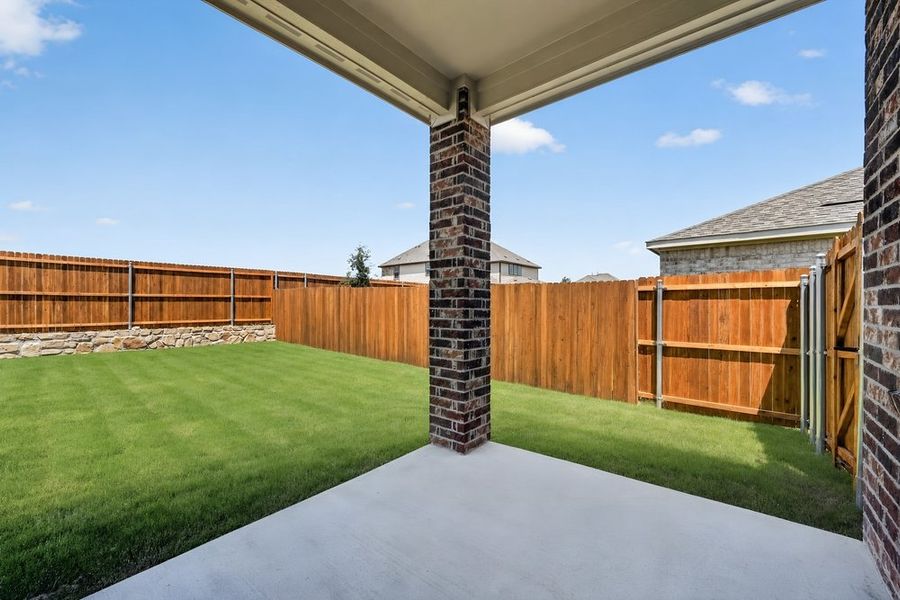 Exterior details and patio area of a home in Parks at Foster Crossing, Anna (Image 3).