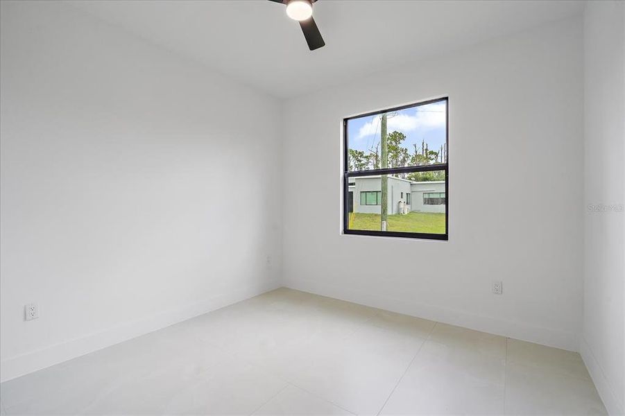 Spacious, unfurnished interior of a new home in , Port Charlotte (Image 16).