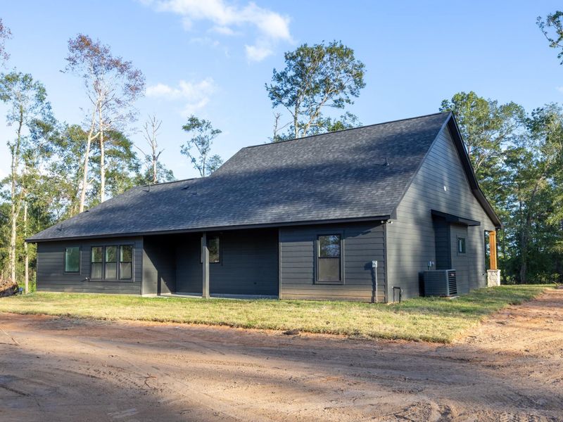 From this angle, appreciate the size of the lot and the privacy provided by the wooded surroundings—perfect for those looking for peace and space. From this angle, appreciate the size of the lot and the privacy provided by the wooded surroundings—perfect for those looking for peace and space.