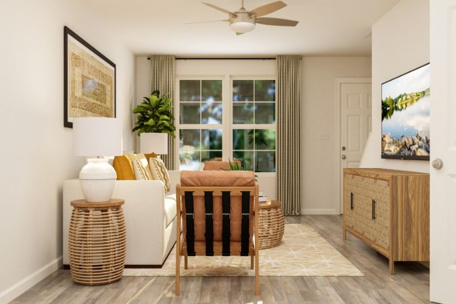 A living room with a couch and a table.