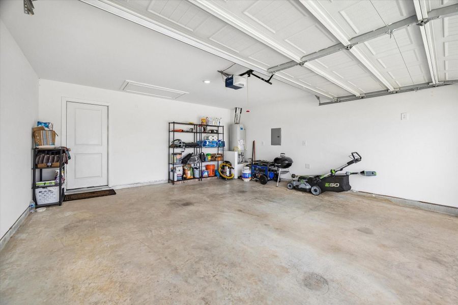 Nice 2 car garage --- all mowing equipment & Webber grill can stay with this house Nice 2 car garage --- all mowing equipment & Webber grill can stay with this house