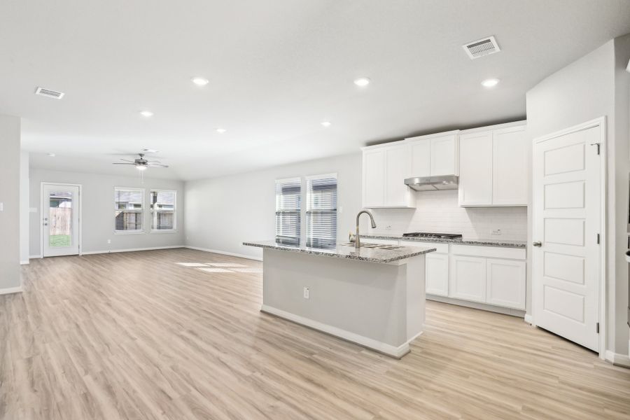 Kitchen in the Oleander floorplan at a Meritage Homes community. Kitchen in the Oleander floorplan at a Meritage Homes community.