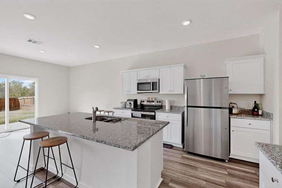 Furnished interior view inside a new home in Meadow Park, Melissa (Image 9). Furnished interior view inside a new home in Meadow Park, Melissa (Image 9).