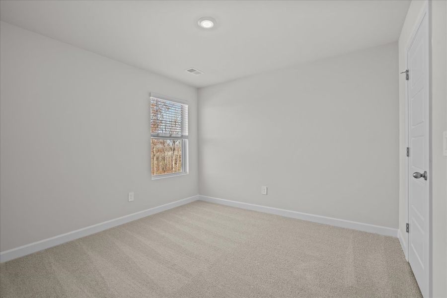 Spacious, unfurnished interior of a new home in The Farm at Wells Creek - Signature Collection, Gray Court (Image 26).