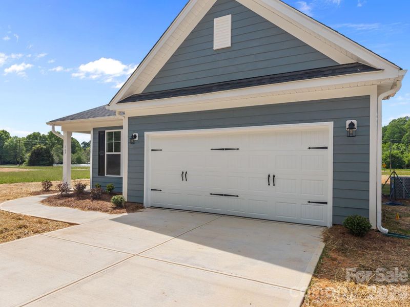 Front exterior of a new home in , Salisbury, NC, highlighting curb appeal (Image 21).