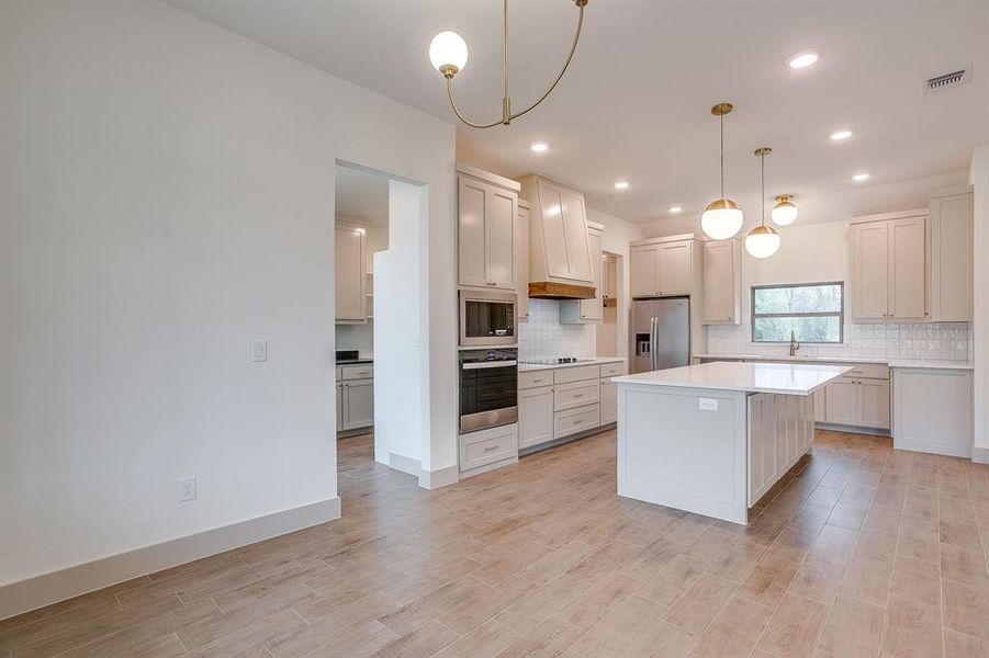 Furnished interior view inside a new home in , Poolville (Image 10).