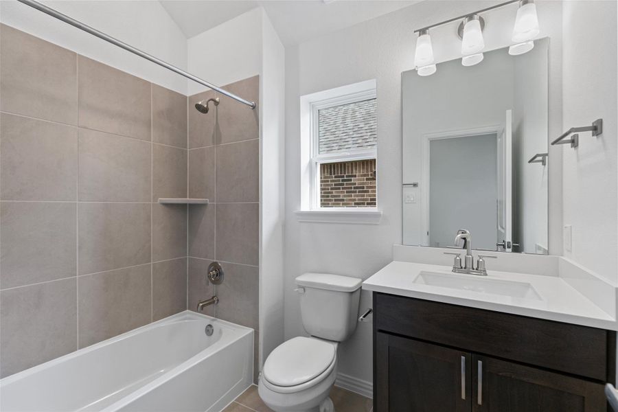 Furnished interior view inside a new home in Aldeana, Bonney (Image 5).