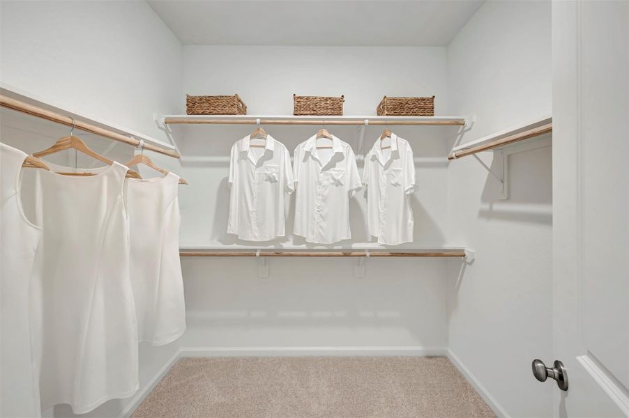 Primary walk-in closet (*Photo not of actual home and used for illustration purposes only.) Primary walk-in closet (*Photo not of actual home and used for illustration purposes only.)