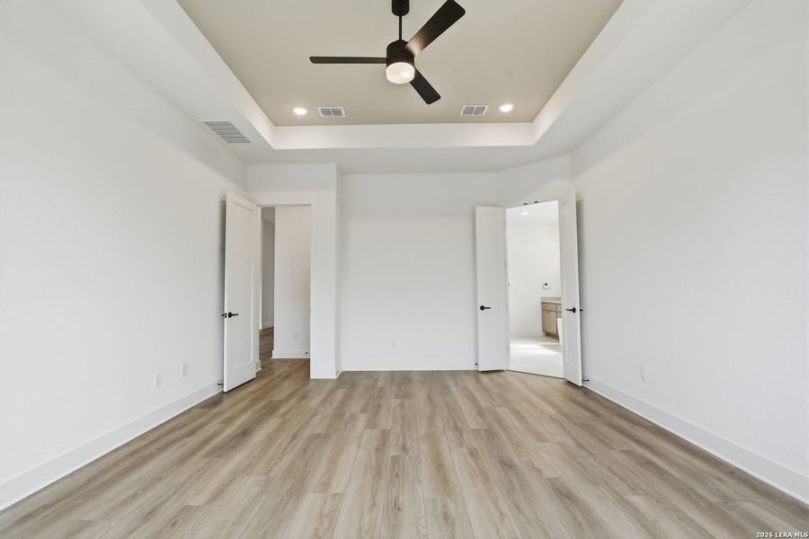 Spacious, unfurnished interior of a new home in Enchanted Bluff, San Antonio (Image 44).