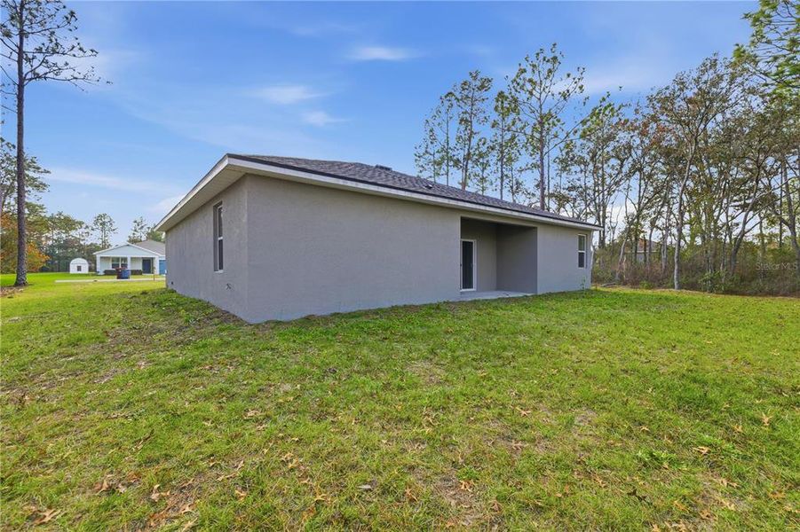 Exterior details and patio area of a home in , Ocala (Image 18).