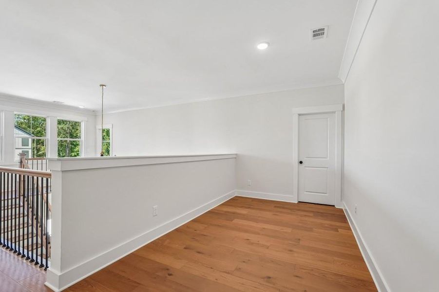 Spacious, unfurnished interior of a new home in Arden on Lanier, Cumming (Image 28).