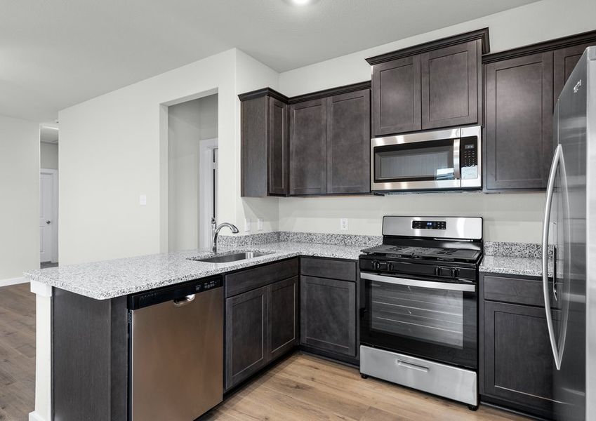 The kitchen has sprawling granite countertops. The kitchen has sprawling granite countertops.