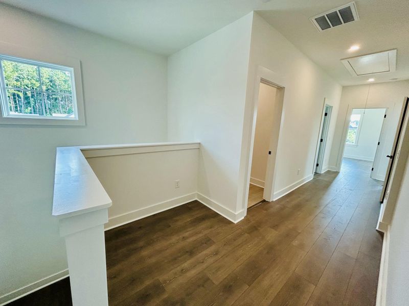 Spacious, unfurnished interior of a new home in The Domus Collection at Midtown Nexton, Summerville (Image 34).