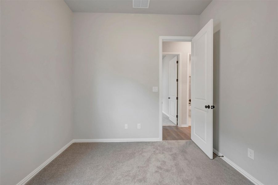 Spacious, unfurnished interior of a new home in Heritage, Dripping Springs (Image 24).