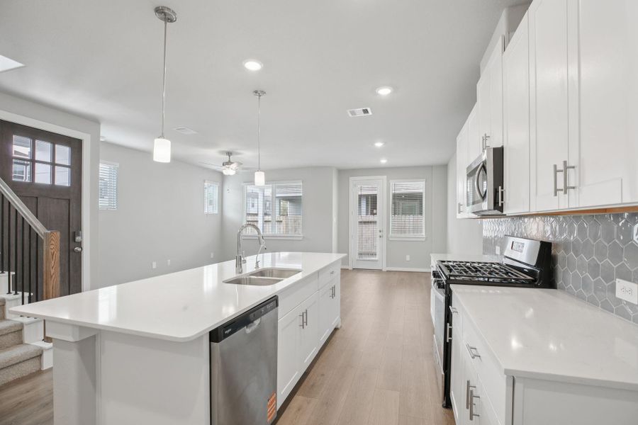 Furnished interior view inside a new home in Spring Brook Village - City Series, Houston (Image 6).