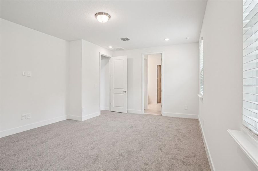 Spacious, unfurnished interior of a new home in Ridgehaven - Signature Series, Ormond Beach (Image 49).