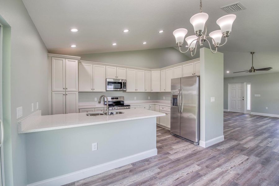 Furnished interior view inside a new home in , Okeechobee (Image 10).
