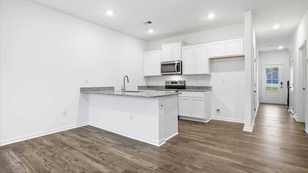 Furnished interior view inside a new home in Cherokee Crossing, Kodak (Image 4). Furnished interior view inside a new home in Cherokee Crossing, Kodak (Image 4).